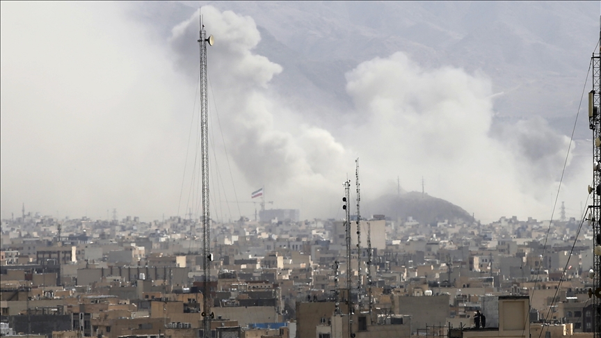 Cityscape with smoke and towers